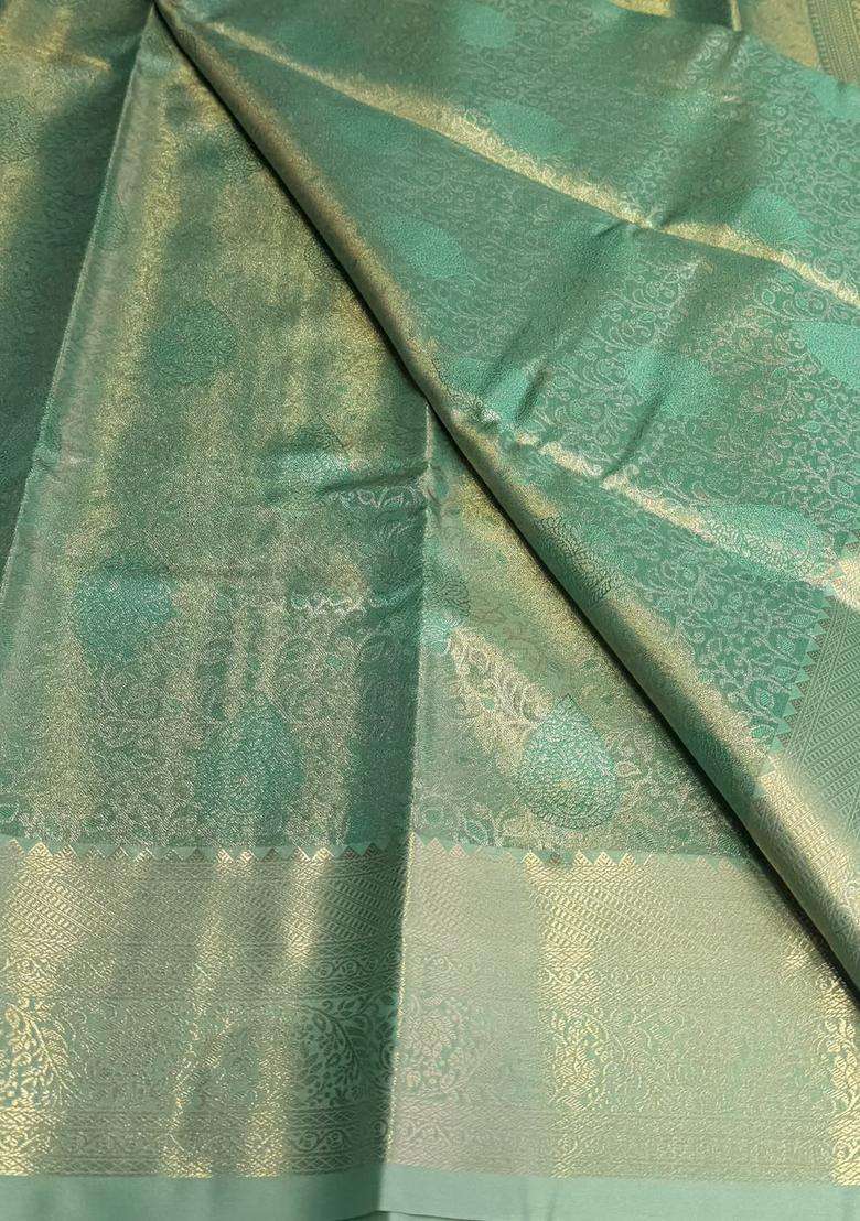 Pastal Green Tissue Kanchipuram Saree With Traditional Woven Design For Women - Indya