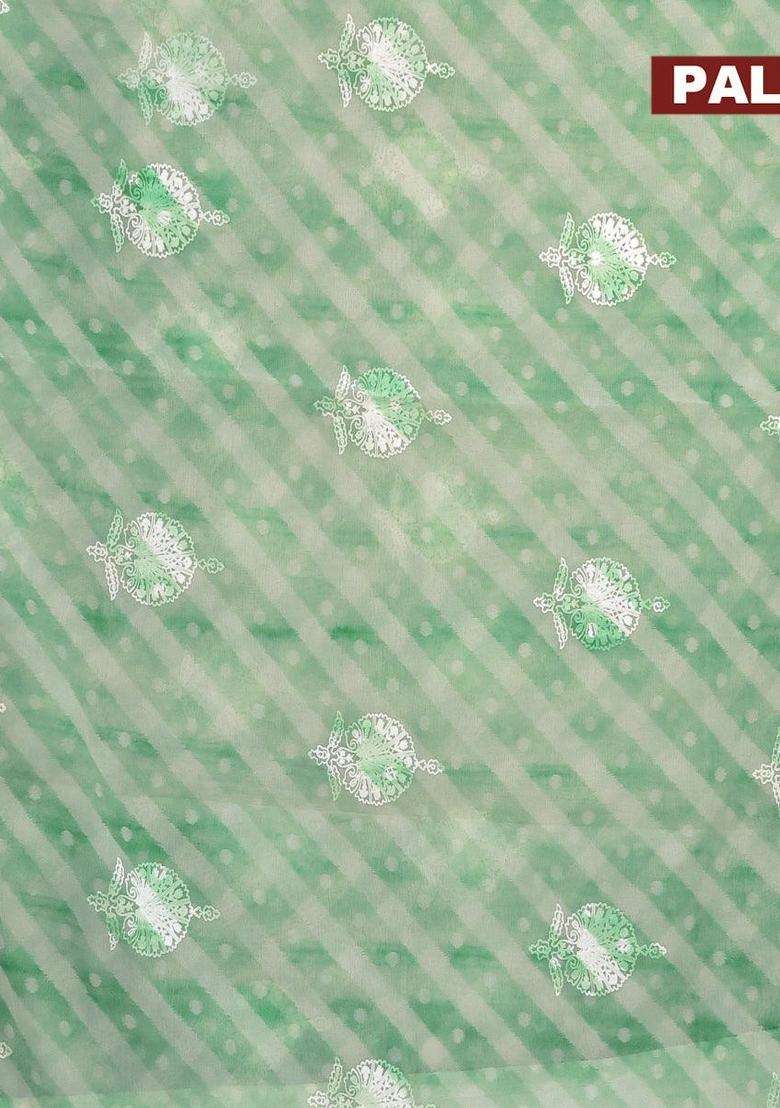 Semi Orangza Organza Saree Off White And Green With Allover Ikat Prints Embroidery Buttas And Crocia Lace Border With Embroidered Design For Women - Indya