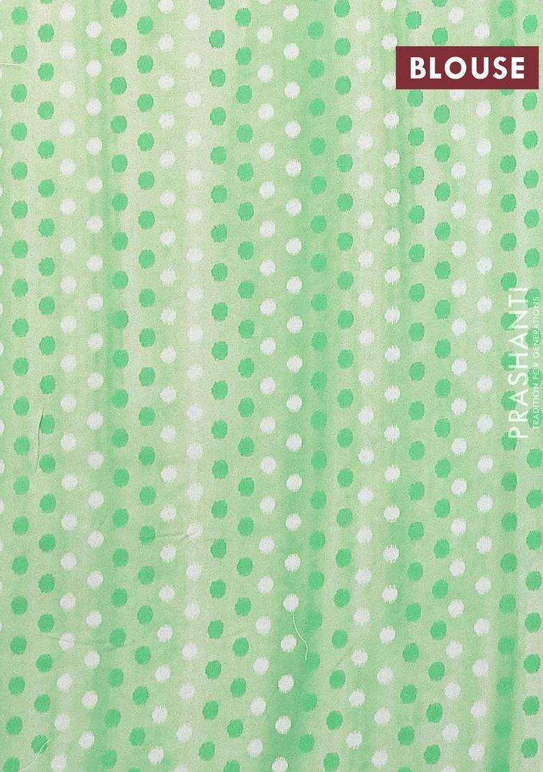 Semi Orangza Organza Saree Off White And Green With Allover Ikat Prints Embroidery Buttas And Crocia Lace Border With Embroidered Design For Women - Indya