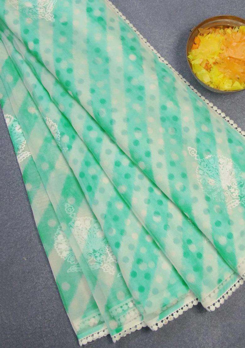 Semi Orangza Organza Saree Off White And Teal Blue With Allover Ikat Prints Embroidery Buttas And Crocia Lace Border With Embroidered Design For Women - Indya