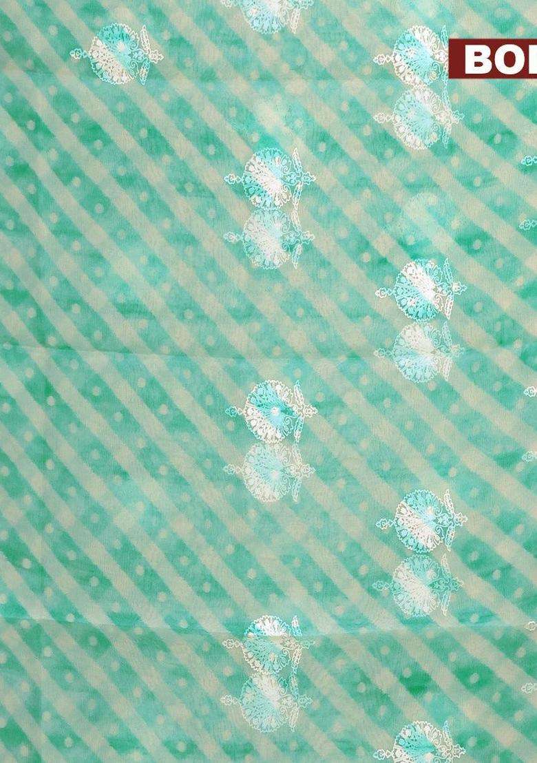 Semi Orangza Organza Saree Off White And Teal Blue With Allover Ikat Prints Embroidery Buttas And Crocia Lace Border With Embroidered Design For Women - Indya