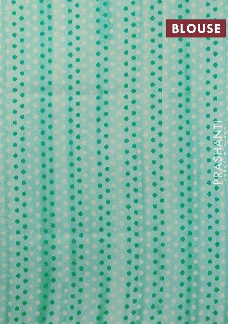 Semi Orangza Organza Saree Off White And Teal Blue With Allover Ikat Prints Embroidery Buttas And Crocia Lace Border With Embroidered Design For Women - Indya