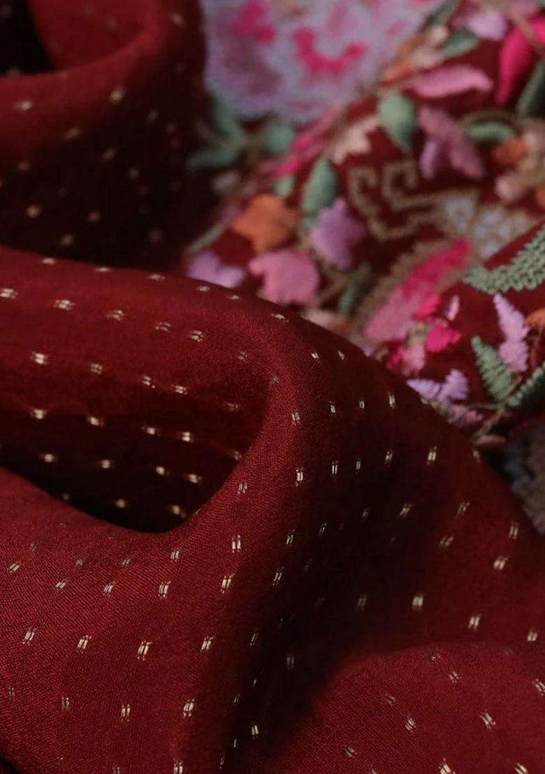 Pure Crepe Saree Maroon Shade With Allover Zari Woven Butta Weaves And Embroidery Work Border With Embroidered Design For Women - Indya