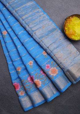 Assam Silk Saree Blue Shade With Allover Zari Weaves Floral Embroidery Work Buttas And Zari Woven Border With Embroidered Design For Women
