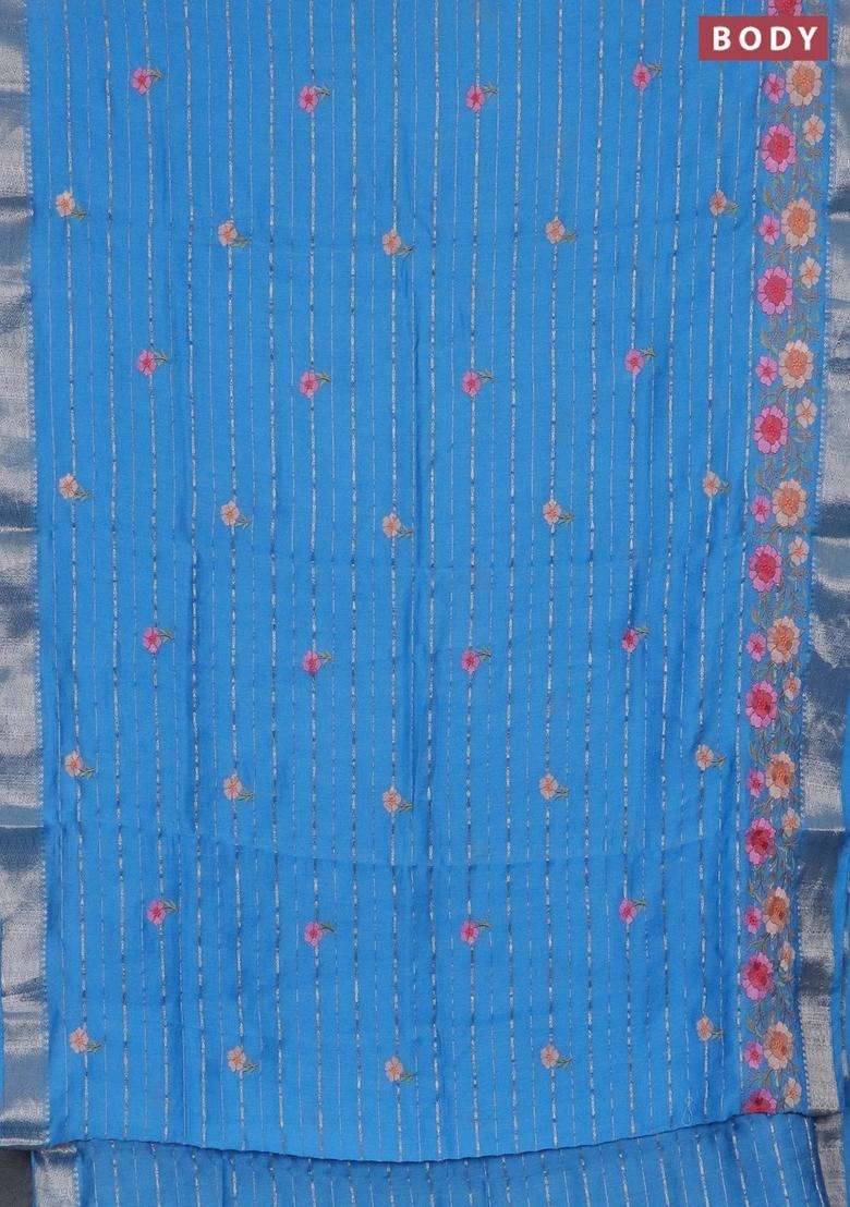 Assam Silk Saree Blue Shade With Allover Zari Weaves Floral Embroidery Work Buttas And Zari Woven Border With Embroidered Design For Women - Indya