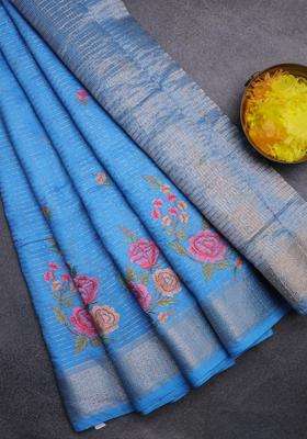 Assam Silk Saree Light Blue With Allover Zari Weaves Floral Embroidery Work Buttas And Zari Woven Border With Embroidered Design For Women