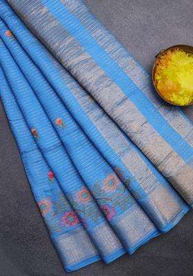 Assam Silk Saree Light Blue With Allover Zari Weaves Floral Embroidery Work Buttas And Zari Woven Border With Embroidered Design For Women