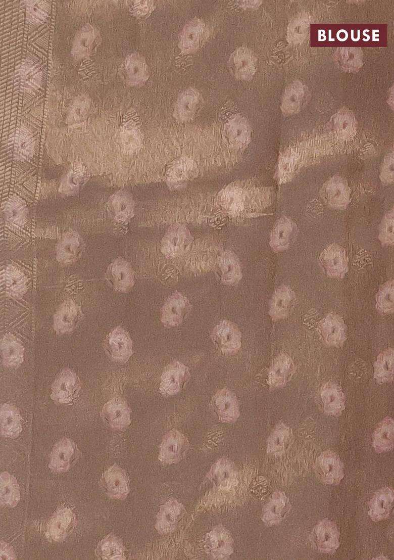 Tissue Saree Cream And Peach Shade With Allover Zari Weaves And Floral Digital Printed Border For Women - Indya