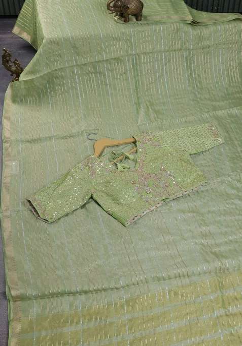 Tissue Silk Saree Light Green With Allover Silver Gold Zari Weaves And Zari Woven Border With Traditional Woven Design For Women