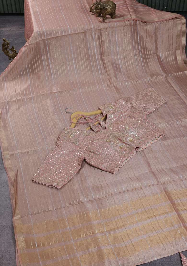 Tissue Silk Saree Pastel Peach With Allover Silver Gold Zari Weaves And Zari Woven Border With Traditional Woven Design For Women - Indya