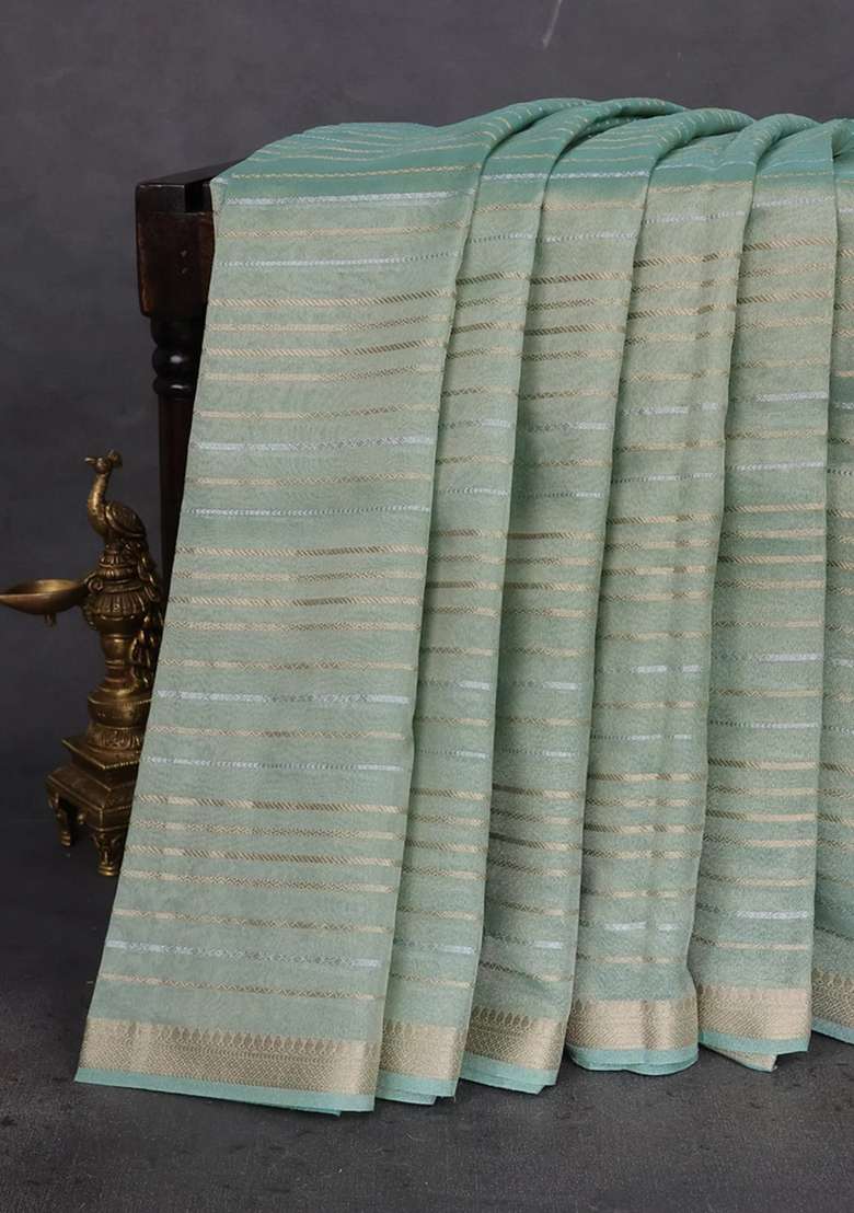 Tissue Silk Saree Pastel Green Shade With Allover Silver Gold Zari Weaves And Zari Woven Border With Traditional Woven Design For Women - Indya