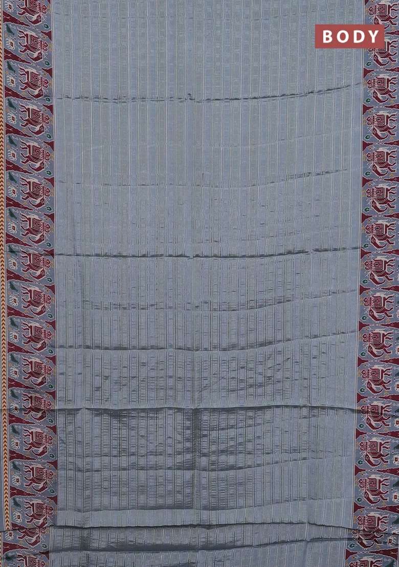 Semi Tussar Saree Pastel Grey With Zari Stripes Pattern And Patola Printed Border For Women - Indya