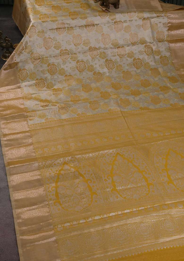 Bangalori Tissue Silk Saree Beige And Mustard Yellow With Zari Woven Floral Design Brocade Pattern And Zari With Buttas And Brocade Design For Women - Indya