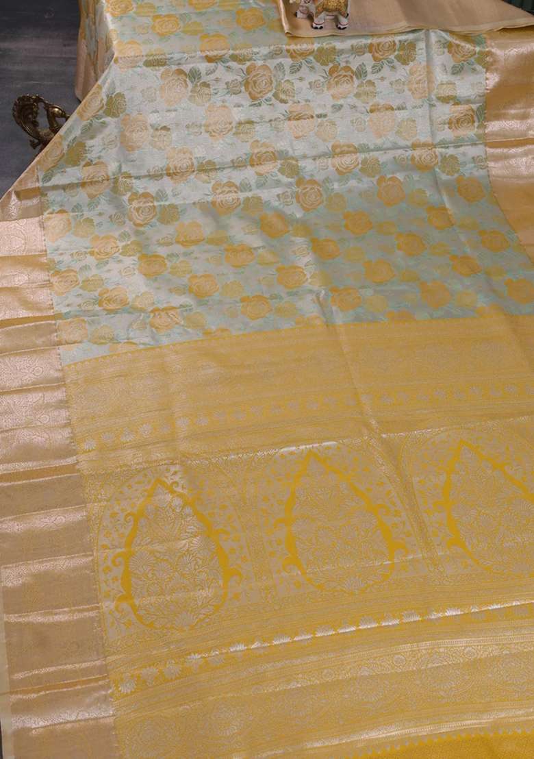 Bangalori Tissue Silk Saree Silver And Mustard Yellow With Zari Woven Floral Design Brocade Pattern And Zari With Buttas And Brocade Design For Women - Indya