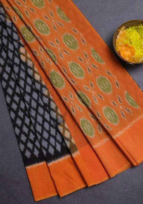 Ikat Cotton Saree Black And Orange With Allover Ikat Weaves And Simple Border With Traditional Woven Design For Women