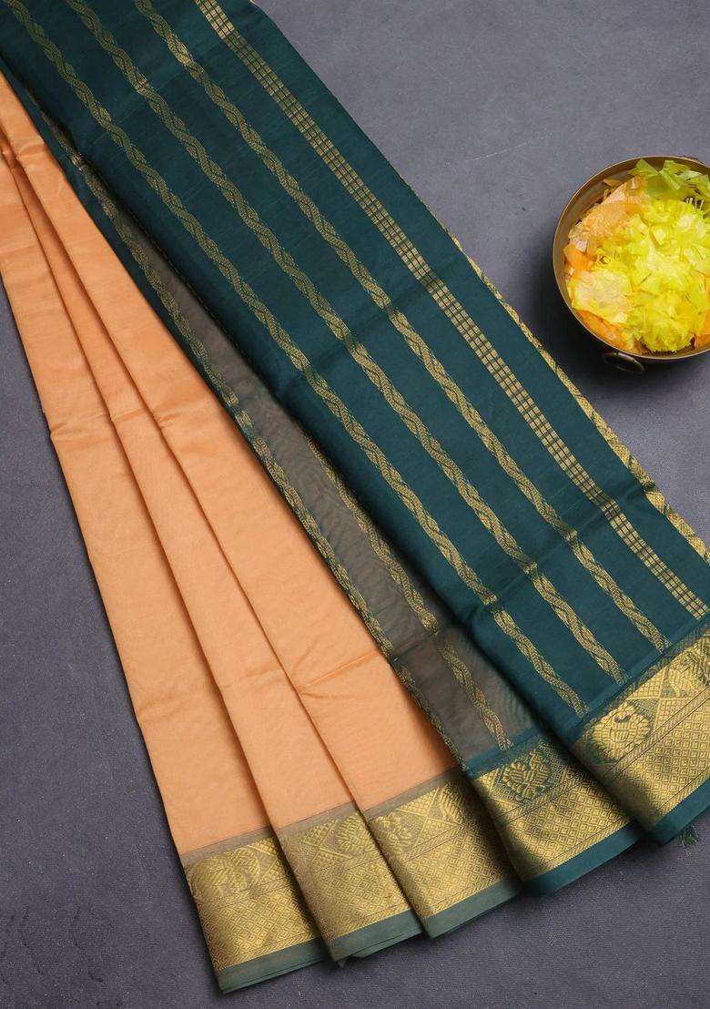 Silk Cotton Saree Pale Orange And Bottle Green With Plain Body And Zari Woven Border With Traditional Woven Design For Women - Indya