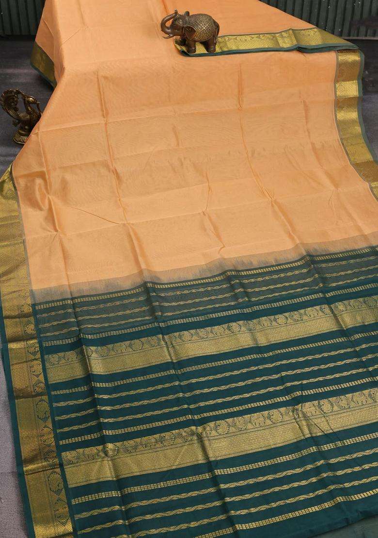 Silk Cotton Saree Pale Orange And Bottle Green With Plain Body And Zari Woven Border With Traditional Woven Design For Women - Indya