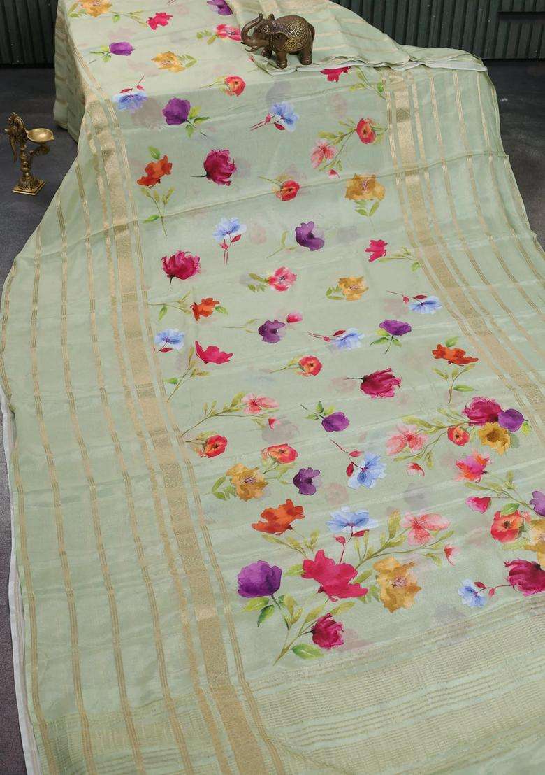 Semi Georgette Saree Pastel Green With Allover Floral Prints And Long Zari Woven Border With Printed Design For Women - Indya