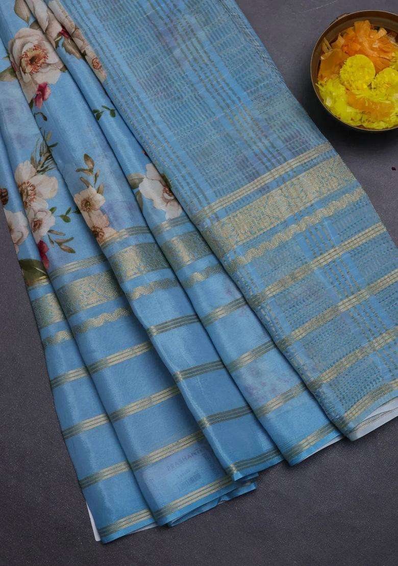 Semi Georgette Saree Blue Shade With Allover Floral Prints And Long Zari Woven Border With Printed Design For Women - Indya