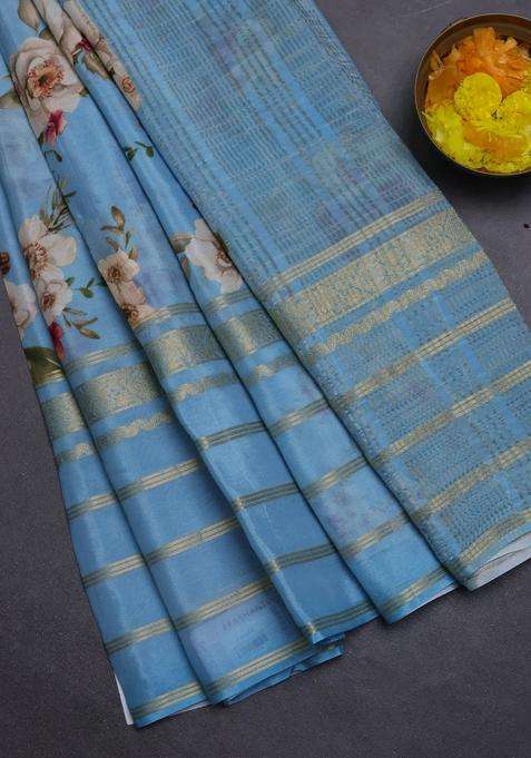 Semi Georgette Saree Blue Shade With Allover Floral Prints And Long Zari Woven Border With Printed Design For Women