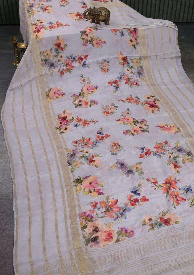 Semi Georgette Saree Pastel Grey With Allover Floral Prints And Long Zari Woven Border With Printed Design For Women - Indya