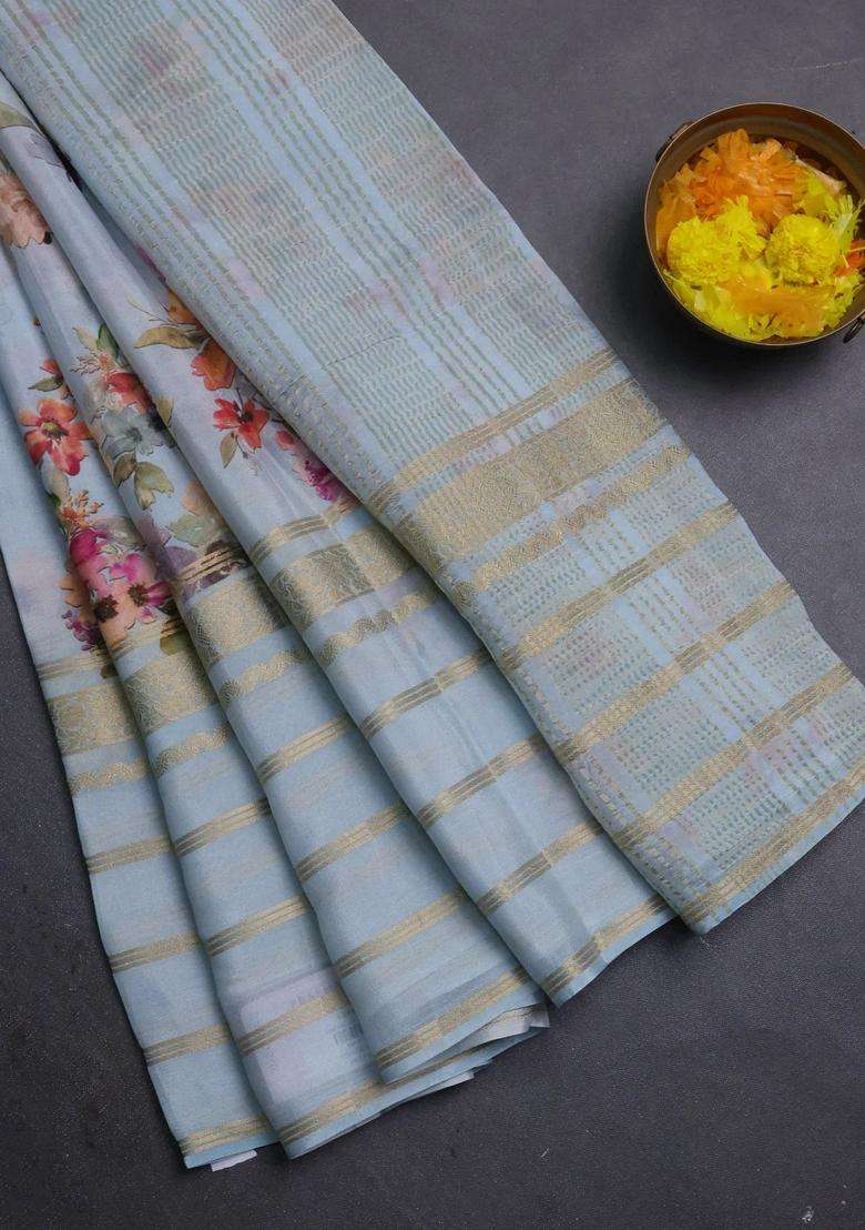 Semi Georgette Saree Pastel Blue With Allover Floral Prints And Long Zari Woven Border With Printed Design For Women - Indya