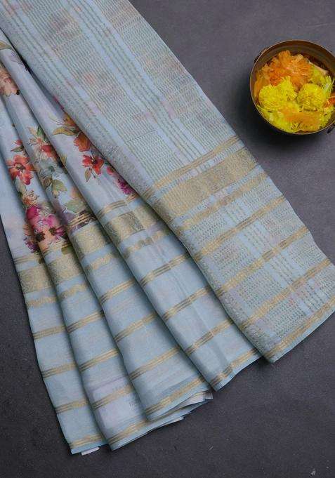 Semi Georgette Saree Pastel Blue With Allover Floral Prints And Long Zari Woven Border With Printed Design For Women