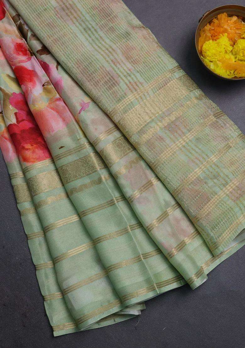 Semi Georgette Saree Pastel Green With Allover Floral Prints And Long Zari Woven Border With Printed Design For Women - Indya