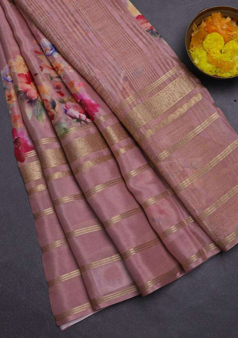 Semi Georgette Saree Pastel Peach Shade With Allover Floral Prints And Long Zari Woven Border With Printed Design For Women - Indya