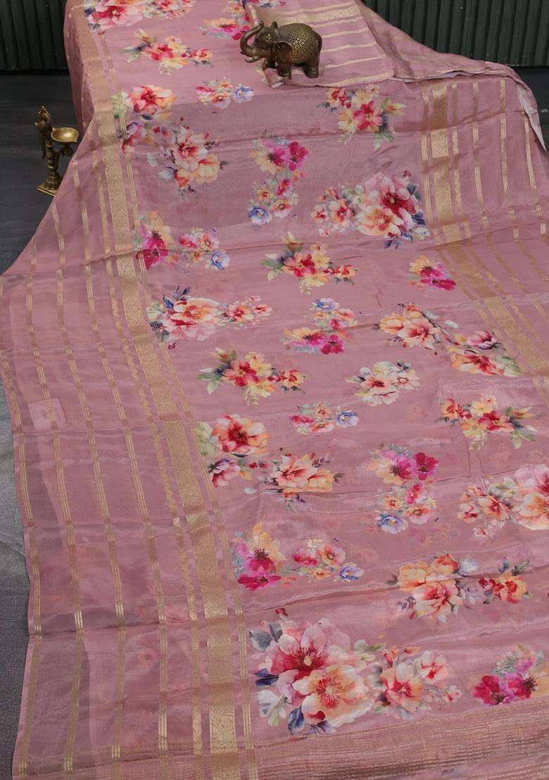 Semi Georgette Saree Pastel Peach Shade With Allover Floral Prints And Long Zari Woven Border With Printed Design For Women - Indya