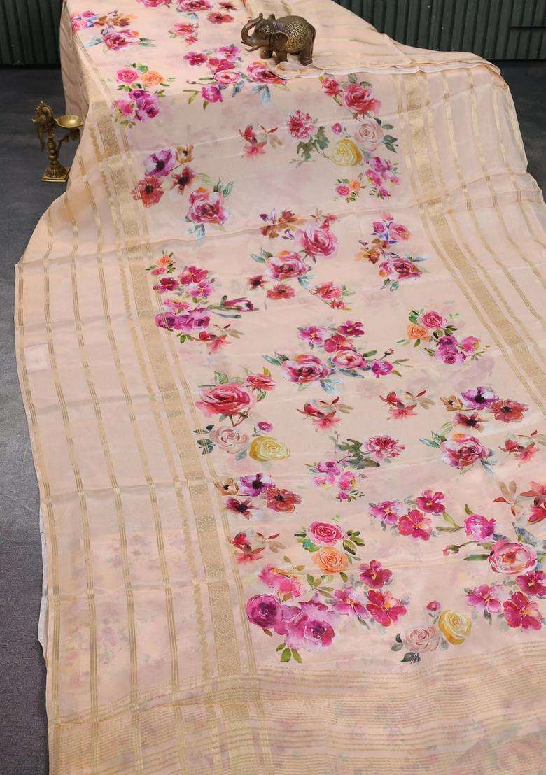 Semi Georgette Saree Pale Orange With Allover Floral Prints And Long Zari Woven Border With Printed Design For Women - Indya
