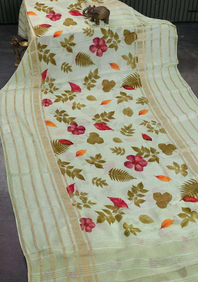 Semi Georgette Saree Pista Green With Allover Floral Prints And Long Zari Woven Border With Printed Design For Women - Indya