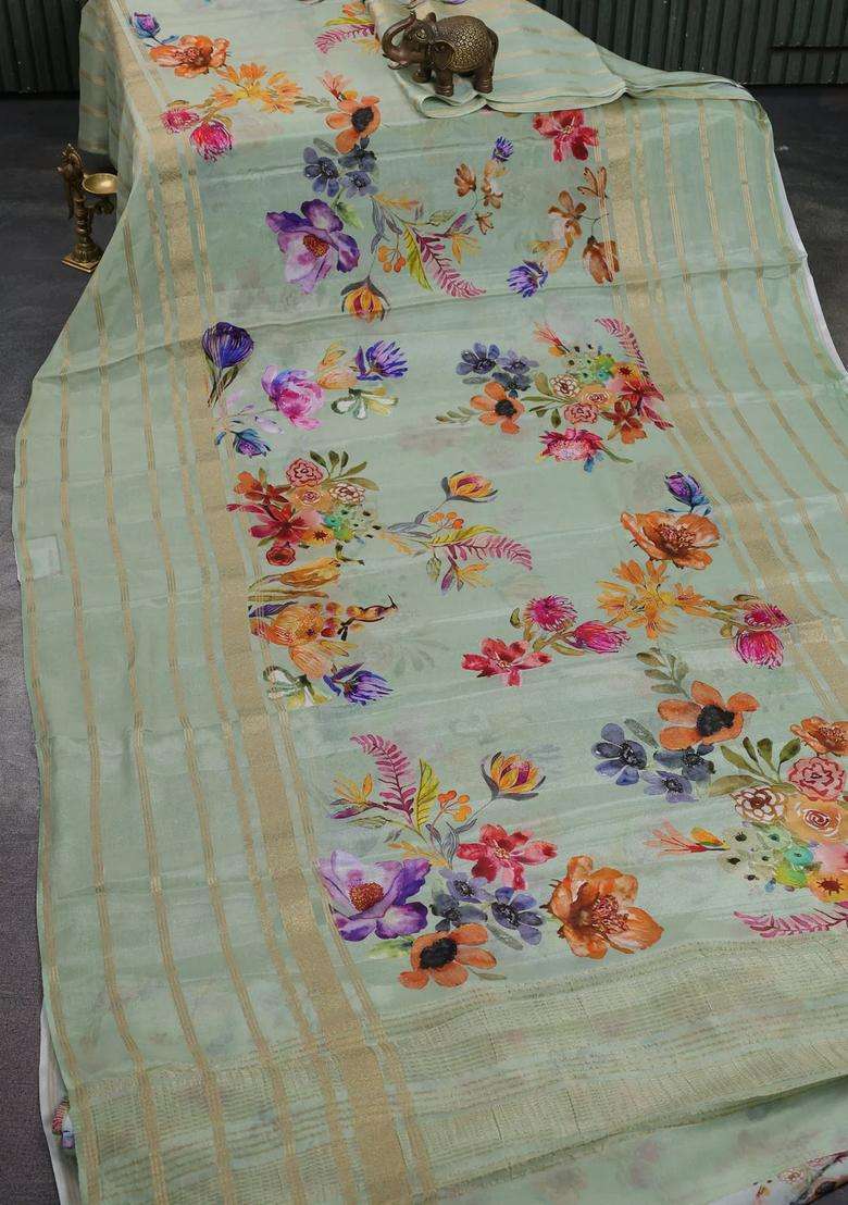 Semi Georgette Saree Pastel Green With Allover Floral Prints And Long Zari Woven Border With Printed Design For Women - Indya