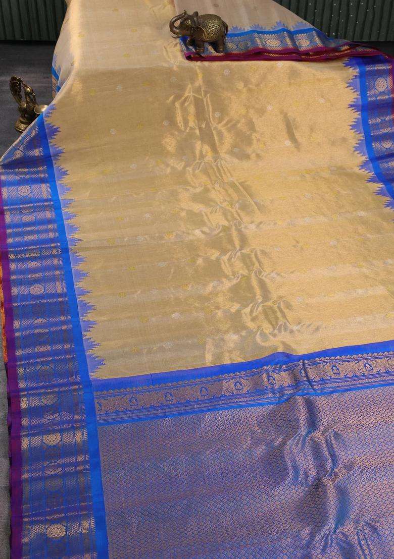 Pure Gadwal Tissue Silk Saree Gold And Cs Blue With Allover Silver Gold Zari Woven Buttas And Temple With Korvai And Temple Border Design For Women - Indya