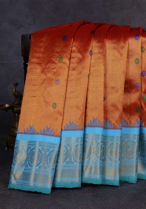 Pure Gadwal Tissue Silk Saree Rust Shade And Teal Blue With Allover Thread Woven Buttas And Temple With Korvai And Temple Border Design For Women