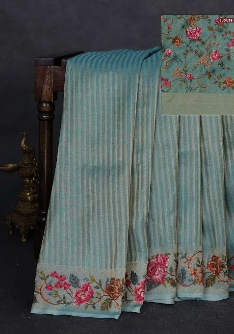 Tissue Saree Teal Blue With Allover Zari Stripe Pattern And Embroidery Border With Embroidered Design For Women