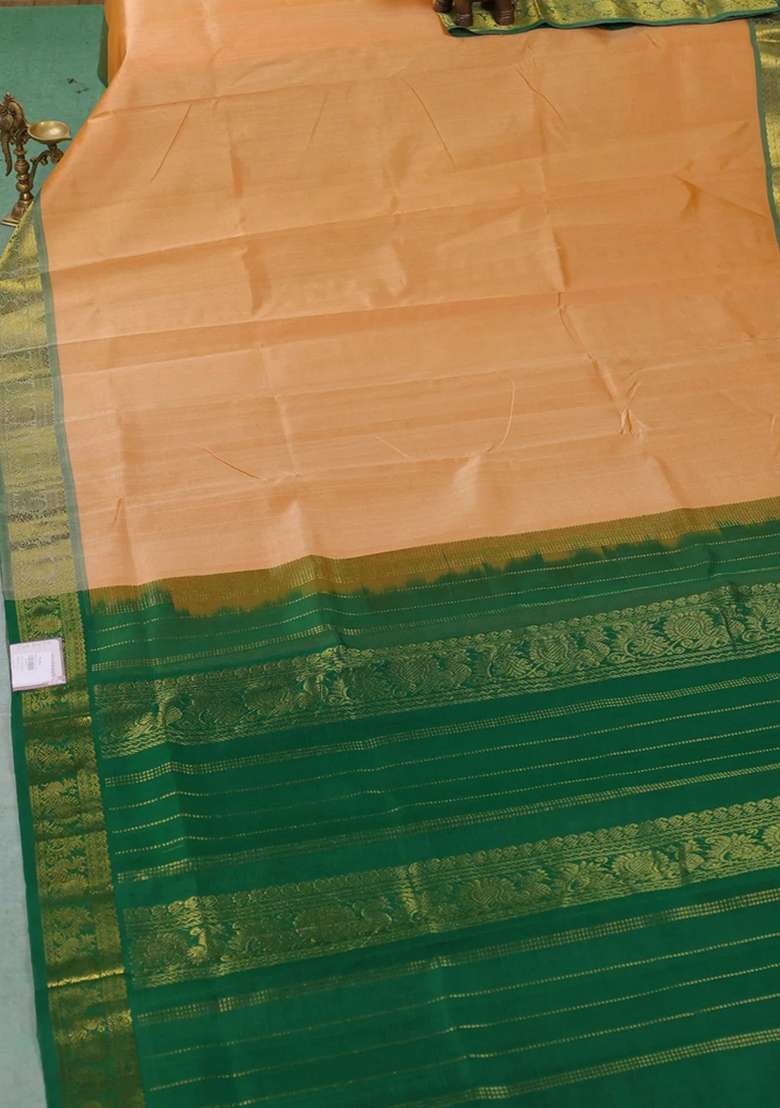 Silk Cotton Saree Pale Orange And Green With Plain Body And Zari Woven Border With Traditional Woven Design For Women - Indya