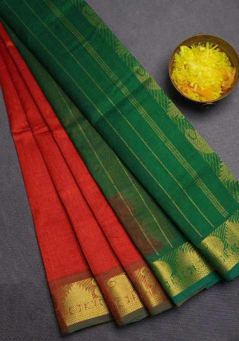 Silk Cotton Saree Rust Shade And Green With Plain Body And Paisley Temple Zari Woven Border With Korvai And Temple Border Design For Women