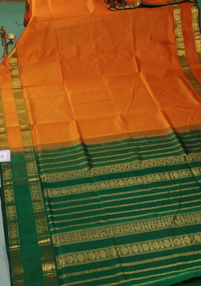 Silk Cotton Saree Sunset Orange And Green With Plain Body And Rettapet Zari Woven Border With Traditional Woven Design For Women - Indya