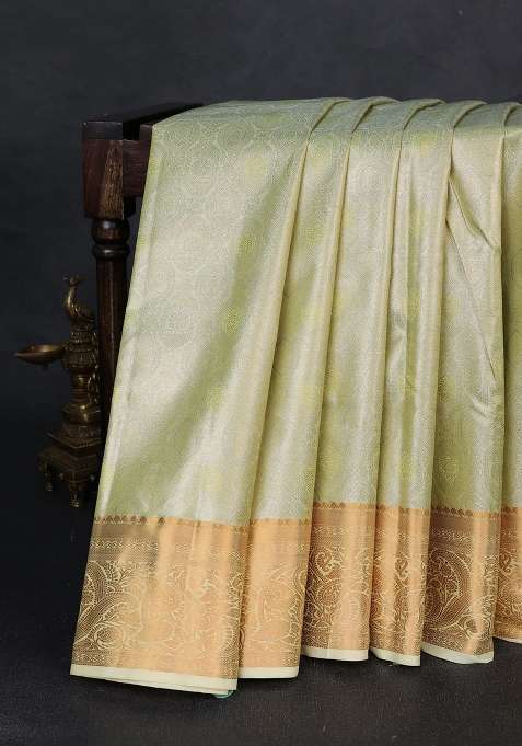 Bangalori Tissue Silk Saree Pista Green And Cream With Allover Zari Woven Brocade Weaves And Zari Woven With Buttas And Brocade Design For Women