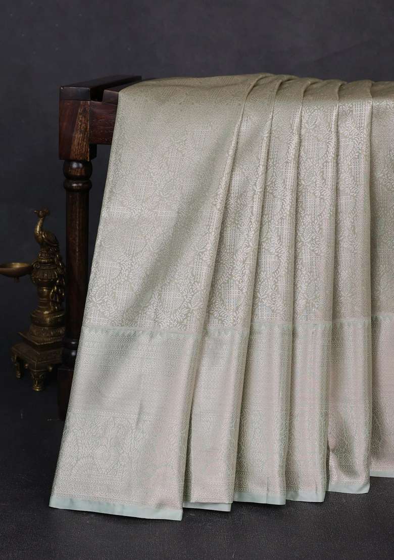 Bangalori Tissue Silk Saree Pista Green With Allover Zari Woven Brocade Weaves And Long Zari Woven Border With Buttas And Brocade Design For Women - Indya