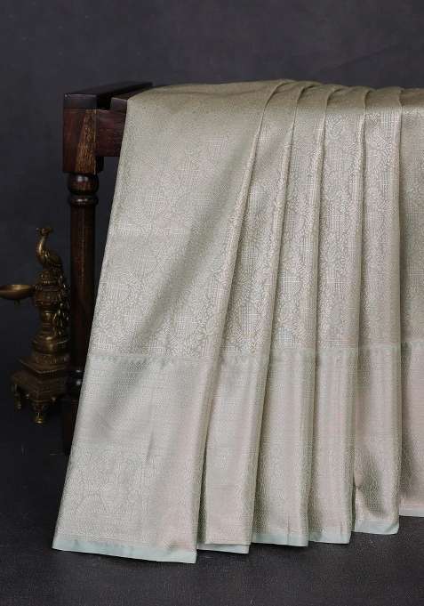 Bangalori Tissue Silk Saree Pista Green With Allover Zari Woven Brocade Weaves And Long Zari Woven Border With Buttas And Brocade Design For Women