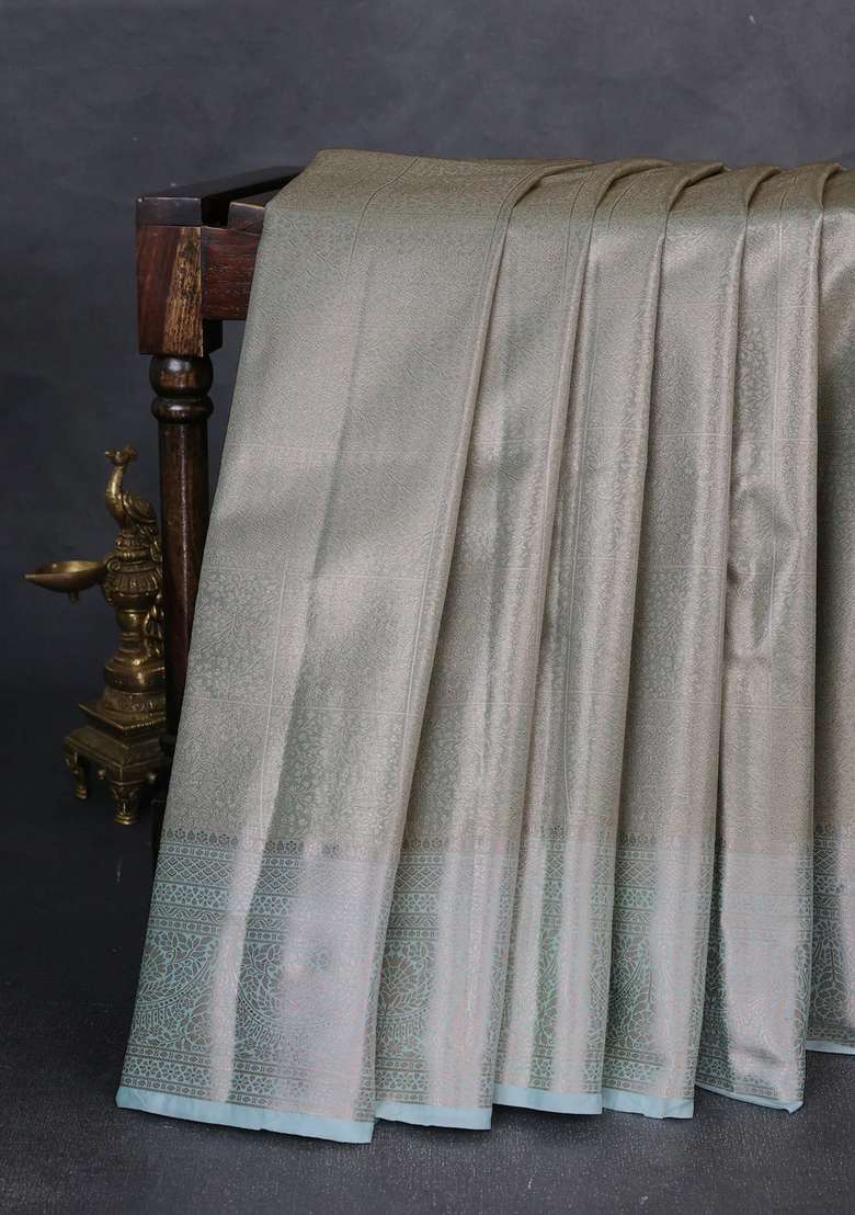 Bangalori Tissue Silk Saree Teal Blue With Allover Zari Woven Brocade Weaves And Zari Woven Border With Buttas And Brocade Design For Women - Indya