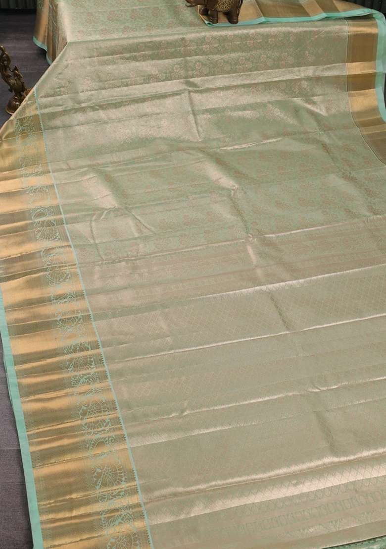 Bangalori Tissue Silk Saree Teal Green With Allover Zari Woven Brocade Weaves And Long Zari Woven Border With Buttas And Brocade Design For Women - Indya