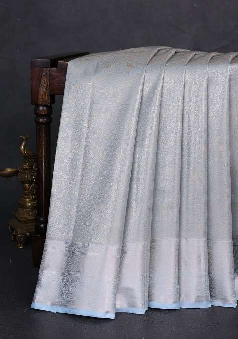 Bangalori Tissue Silk Saree Pastel Blue With Allover Zari Woven Brocade Weaves And Zari Woven Border With Buttas And Brocade Design For Women