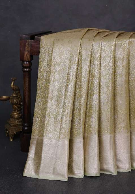 Bangalori Tissue Silk Saree Mehendi Green With Allover Zari Woven Brocade Weaves And Long Zari Woven Border With Buttas And Brocade Design For Women
