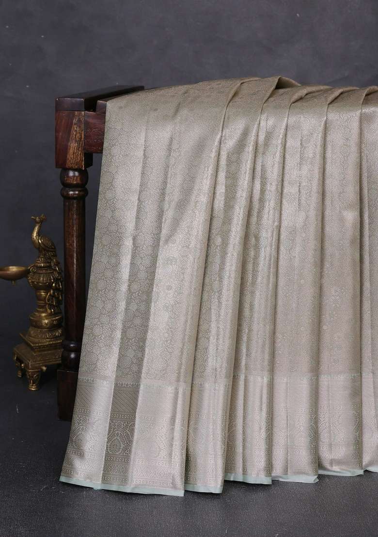 Bangalori Tissue Silk Saree Pista Green With Allover Zari Woven Brocade Weaves And Long Zari Woven Border With Buttas And Brocade Design For Women - Indya