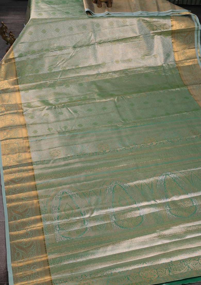 Bangalori Tissue Silk Saree Teal Green With Allover Zari Woven Brocade Weaves And Zari Woven Border With Buttas And Brocade Design For Women - Indya