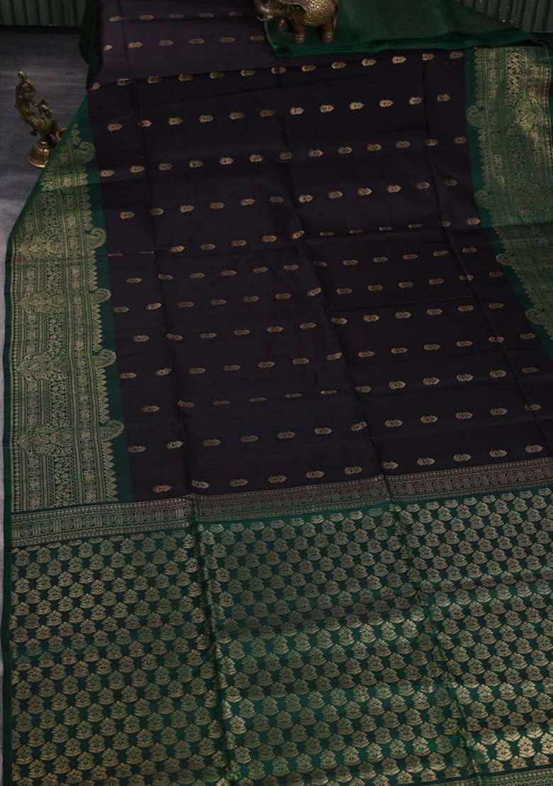 Kanchipuram Soft Silk Saree Black And Green With Allover Zari Woven Buttas And Long Zari Woven Border With Buttas And Brocade Design For Women - Indya