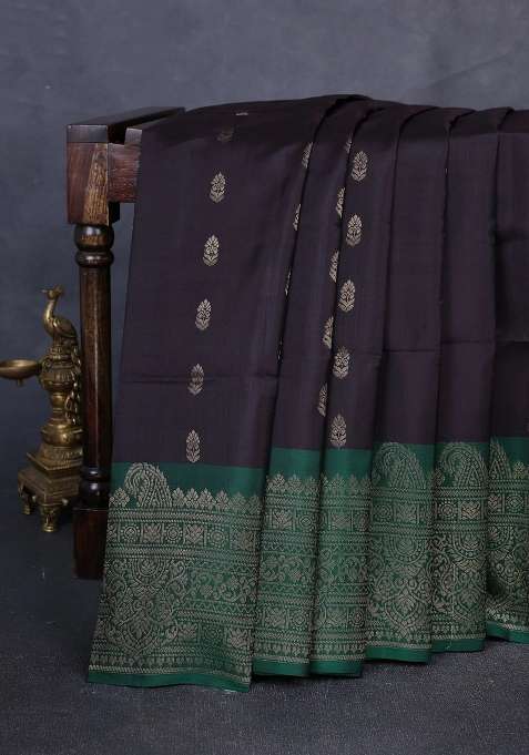 Kanchipuram Soft Silk Saree Black And Green With Allover Zari Woven Buttas And Long Zari Woven Border With Buttas And Brocade Design For Women